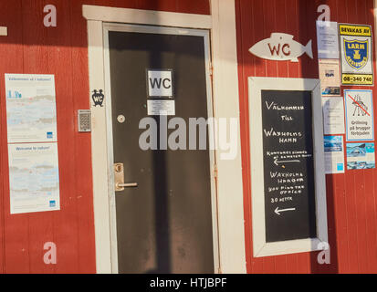 Toilet and notice board in guest harbour, Vaxholm, Stockholm archipelago, Sweden, Scandinavia Stock Photo