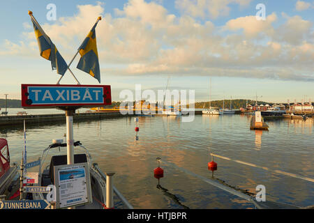 Taxi boat embarkation point, Vaxholm harbour at dawn, Stockholm archipelago, Sweden, Scandinavia Stock Photo
