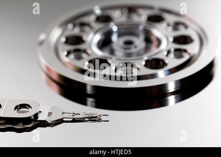 Close-up of read-and-write head and disk platter in hard disk drive Stock Photo