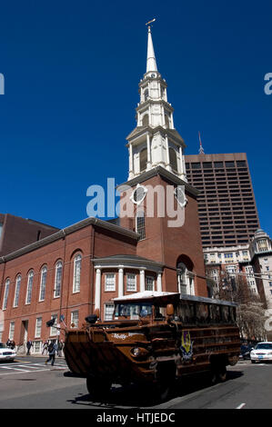 A duck tour vehicle passes the historic Park Street Church, Boston, Massachusetts Stock Photo