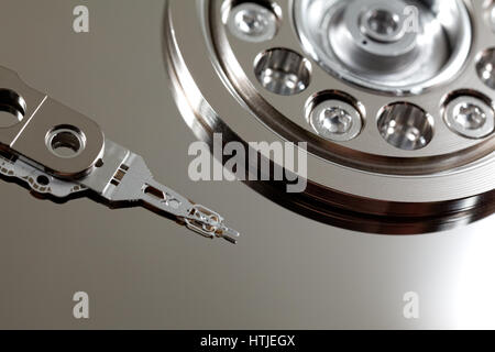 Close-up of read-and-write head and disk platter in hard disk drive Stock Photo