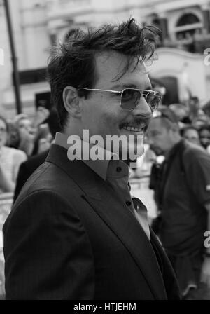 London, UK, 21st July 2013. Johnny Depp ( Image digitally altered to monochrome ) attends the premiere of 'The Lone Ranger' at Odeon Leicester Square Stock Photo