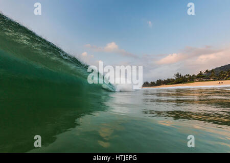 A shore break wave at Keiki beach on the North Shore of Oahu. Stock Photo