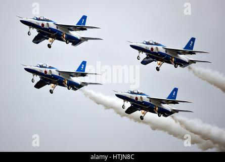 The Blue Impulse Japanese aerobatic demonstration team performs a four-ship formation flyby over the Misawa Air Base during the Misawa Air Festival September 19, 2010 near Misawa, Japan.        (photo by Chad Strohmeyer /U.S. Air Force  via Planetpix) Stock Photo