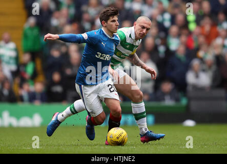 Rangers' Emerson Hyndman (left) and Celtic's Scott Brown battle for the ball during the Ladbrokes Scottish Premiership match at Celtic Park, Glasgow. Stock Photo