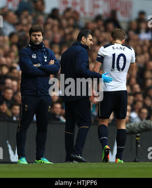 Tottenham manager Mauricio Pochettino leaves the field after first half ...