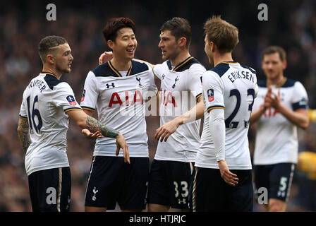 Tottenham Hotspur's Son Heung-Min (centre left) celebrates with team-mates Kieran Trippier (left), Ben Davies (centre right) and Christian Eriksen after scoring his side's second goal during the Emirates FA Cup, Quarter Final match at White Hart Lane, London. Stock Photo