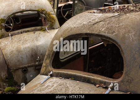Rusty old vintage cars, scrap yard, Bastnäs, Värmland, Sweden Stock Photo