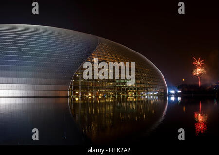 China national theater and the fireworks in the eve of Chinese New Year Stock Photo