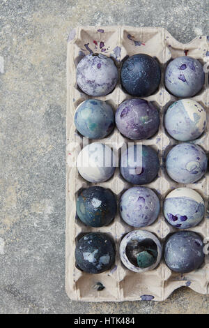 Painted easter eggs on stone background Stock Photo