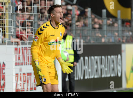 Freiburg, Germany. 11th Mar, 2017. Freiburg's Alexander Schwolow reacts during the German Bundesliga soccer match between SC Freiburg and 1899 Hoffenheim in the Schwarzwald Stadium in Freiburg im Breisgau, Germany, 11 March 2017. Photo: Patrick Seeger/dpa Credit: dpa picture alliance/Alamy Live News Stock Photo