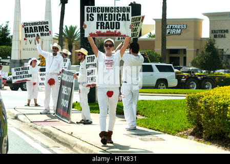 Orlando Florida - March 9th 2017: Public Protest of circumcision at the Millenia Mall entrance this weekend in Orlando, Florida, on March 9th, 2017 Stock Photo