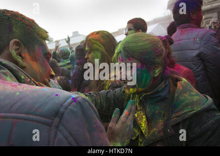 Lemont, Illinois, USA. 12th Mar, 2017. Hindu's and other participants celebrate the ''˜festival of color,'' also know as Holi at The Hindu Temple of Greater Chicago in Lemont, Illinois by throwing color powders into the air and on to each other. Credit: Rick Majewski/ZUMA Wire/Alamy Live News Stock Photo