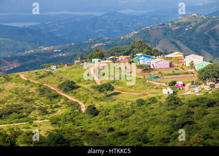 Above view landscape of colorful rural housing against Inanda dam and the Valley of a Thousand Hills in Bothas Hill in Durban, South Africa Stock Photo