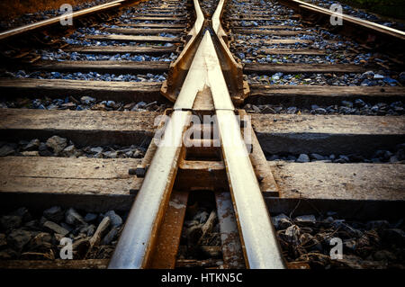 Railway in fog on station, outdoor landscape Stock Photo