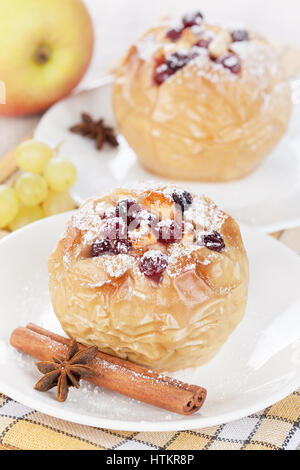 Apples baked with honey and cranberries Stock Photo