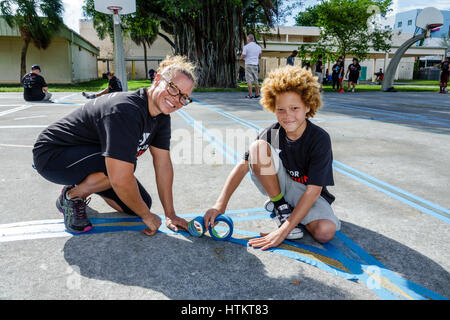 Miami Florida,Allapattah,Comstock Elementary School,Martin Luther King Jr. Day of Service,MLK,beautification project,woman female women,boy boys,male Stock Photo