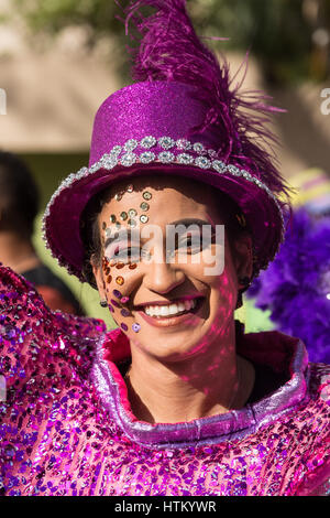 Costumed woman marches in the La Vega Carnival parade.   The first documented Carnival celebration in what is now the Dominican Republic was held in L Stock Photo