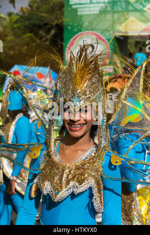 Costumed woman marches in the La Vega Carnival parade.   The first documented Carnival celebration in what is now the Dominican Republic was held in L Stock Photo