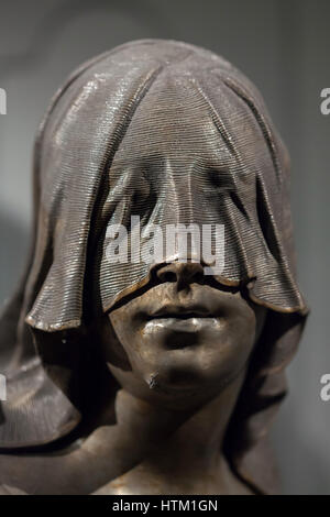 Mourning woman with veiled face depicted on the sarcophagus of the Empress Elisabeth Christine of Brunswick-Wolfenbuttel (1691 - 1750) in the Kaisergruft (Imperial Crypt) in Vienna, Austria. Empress Elisabeth Christine was a wife of Holy Roman Emperor Charles VI and a mother of Empress Maria Theresa. The statue is the earliest work by Austrian sculptor Balthasar Ferdinand Moll. Stock Photo