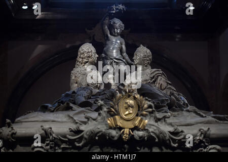 Sarcophagus of Empress Maria Theresa of Austria (1717 - 1780) and her husband Holy Roman Emperor Francis I (1708 - 1765) in the Kaisergruft (Imperial Crypt) in Vienna, Austria. Statue by Austrian sculptor Balthasar Ferdinand Moll placed on the sarcophagus. Stock Photo