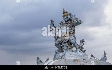 Hanuman statue attacking evil gods Stock Photo