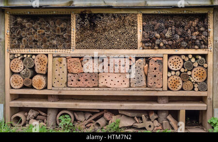 A Wildlife Stack made to provide places or refuges for wild creatures to live in the dead and decaying wood materials which imitate natural features. Stock Photo