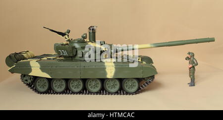 soldier in overalls and  helmet standing at battle panzer Stock Photo