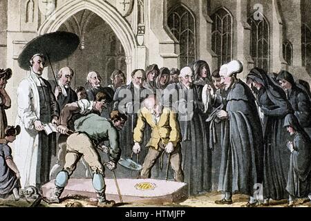 Dr Syntax watching wife's coffin being lowered into grave. Rowlandson illustration for William Coombe 'Dr Syntax' London 1820. Aquatint Stock Photo