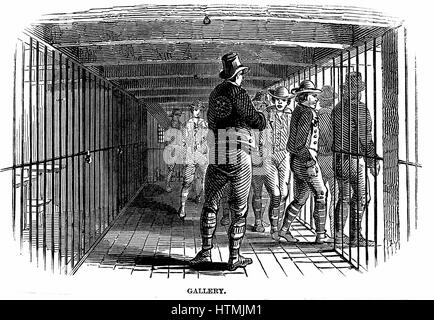 Prison Hulks: Warder watching prisoners entering their ward on board convict hulk 'Warrior' at Woolwich. This hulk held 600 and was an intermediate confinement between an ordinary gaol or transportation. Prisoners were used as labourers in the navy dockya Stock Photo
