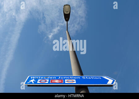 right pointing sign for willesden junction station, west london, england Stock Photo