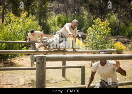 Military soldiers training on fitness trail at boot camp Stock Photo