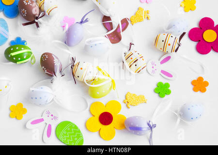 Easter eggs decorations, bunnies, flowers and feathers Stock Photo