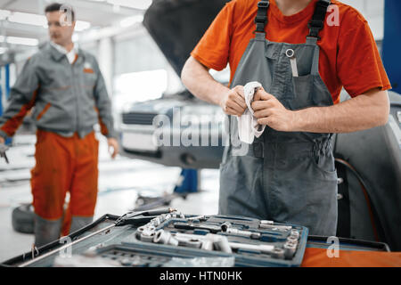 Car mechanic keeping tools polished and clean Stock Photo