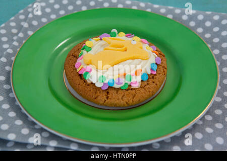 Chocolate cookie served in a plate on a napkin Stock Photo