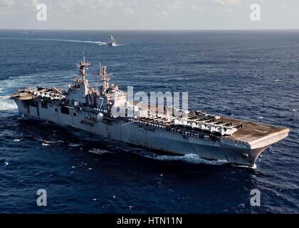 The USN Wasp-class amphibious assault ship USS Iwo Jima steams underway December 10, 2012 in the Atlantic Ocean. Stock Photo