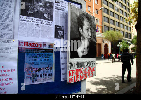 La Paz, Bolivia, 13th March 2017. A board with information about events during Bolivia's military dictatorships and Plan Condor outside the Justice Ministry building. Today victims of the dictatorships commemorate 5 years of protests demanding justice and compensation for those that suffered, and that the government releases files from the period to help establish the truth about what happened. Marcelo Quiroga Santa Cruz was a writer and politician who was abducted during the coup of July 17 1980 and later murdered. Credit: James Brunker/Alamy Live News Stock Photo