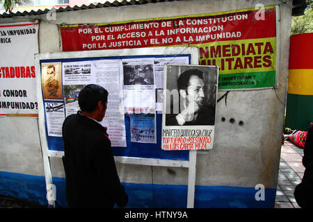 La Paz, Bolivia, 13th March 2017. A man reads information about events during Bolivia's military dictatorships. Today victims of the dictatorships commemorate 5 years of protests demanding justice and compensation for those that suffered, and that the government releases files from the period to help establish the truth about what happened. Credit: James Brunker/Alamy Live News Stock Photo