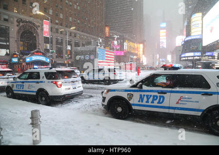 Police cars sitting in Times Square during Winter Storm Stella in Times Square. Stock Photo