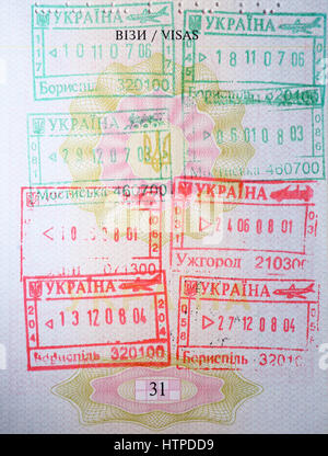 Page of Passport with Ukrainian entry and exit stamps Stock Photo