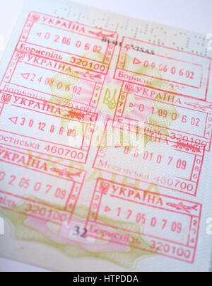 Page of Passport with Ukrainian entry and exit stamps Stock Photo