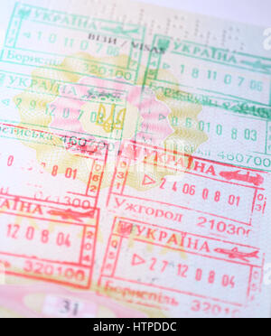 Page of Passport with Ukrainian entry and exit stamps Stock Photo