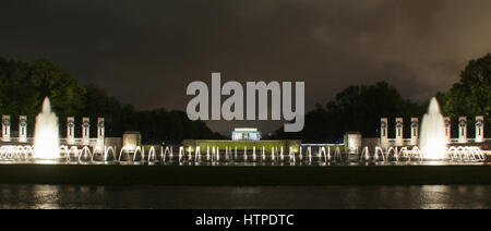 Washington DC, USA - April 28 2014: The Lincoln Memorial with the fountains of the World War II Memorial at night. Stock Photo