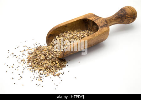 Flax, chia and sesame seeds in wooden scoop on white isolated background Stock Photo