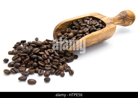Roasted coffee beans in wooden scoop on white isolated background Stock Photo