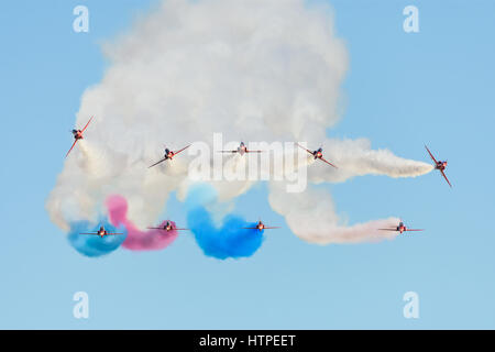 Head on view of the Red Arrows as they prepare to enter a dramatic break during an airshow display Stock Photo