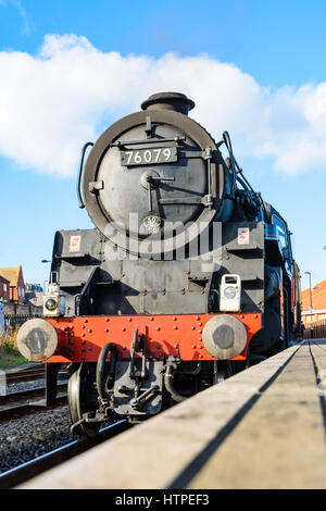 A BR Standard Class 4 Mogul steam train waiting to depart Whitby station on the North Yorks Moors Railway Stock Photo