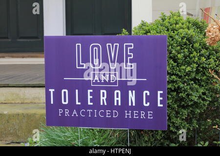 Yard Sign Love and Tolerance Practiced Here Stock Photo