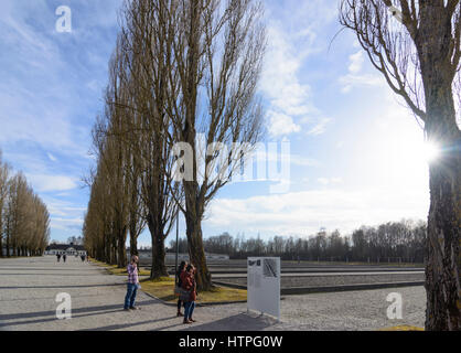 Dachau, concentration camp: camp road, view to former maintenance building (today exhibition), prisoner  barracks that are indicated by concrete found Stock Photo