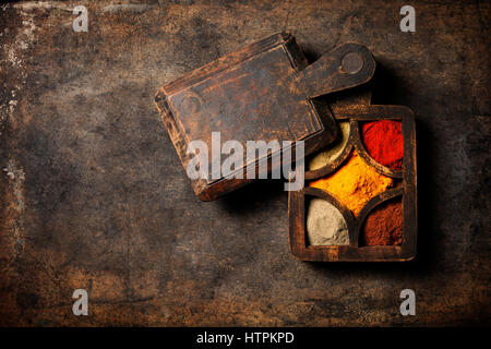 Spices selection over dark vintage table. Stock Photo